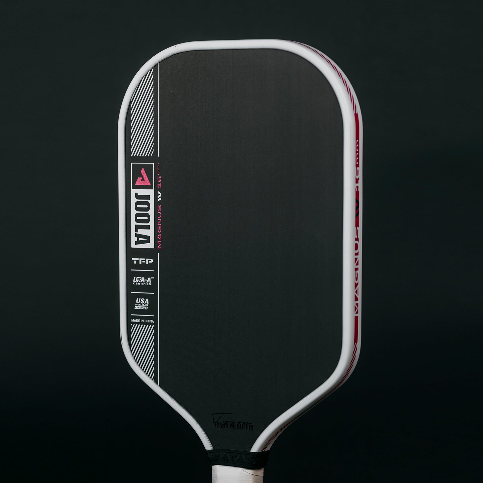 Black background, product image of the JOOLA Tyson McGuffin Magnus Pro IV Pickleball Paddle.